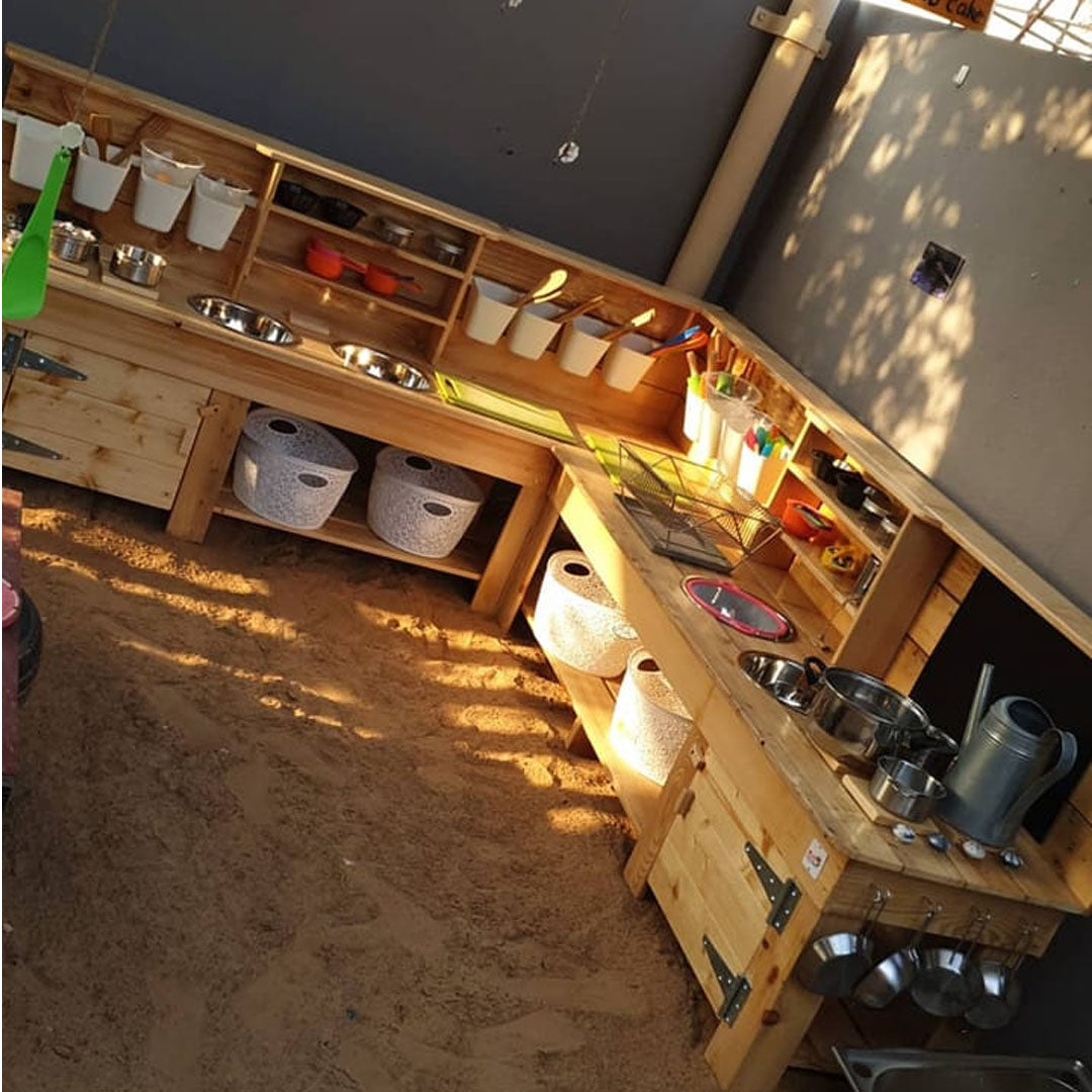 Hand built wooden mud kitchen for endless fun