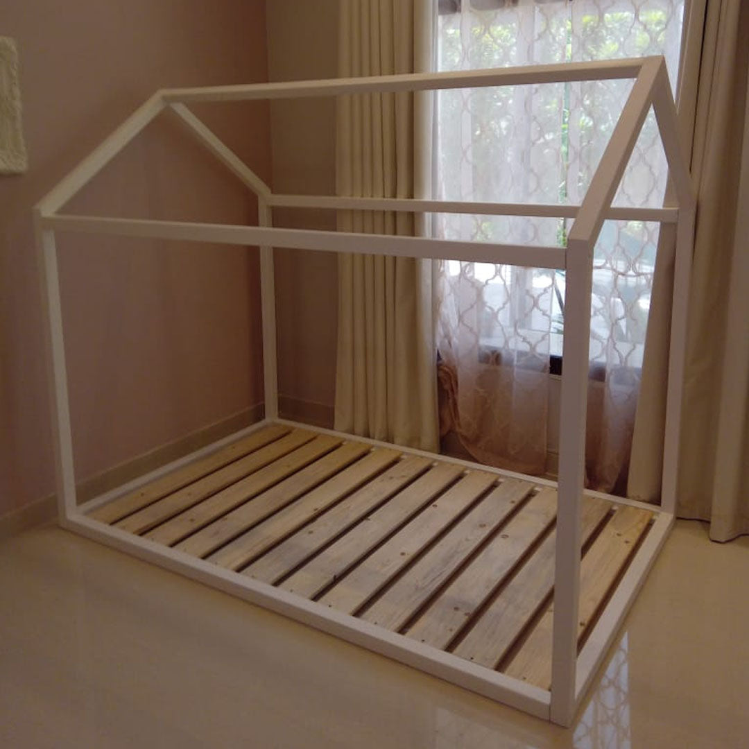 Beautiful handmade, solid house bed.