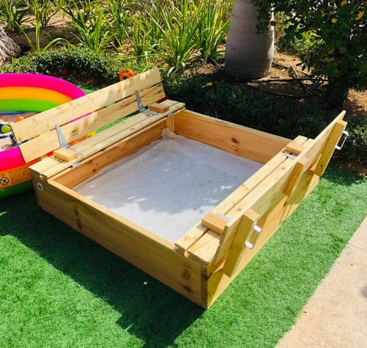 Hand built wooden sandpit with folding benches/lid