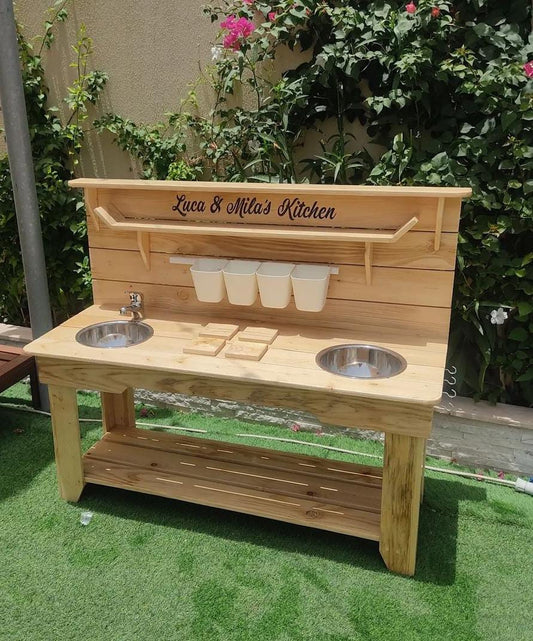 Hand built wooden kids mud kitchen