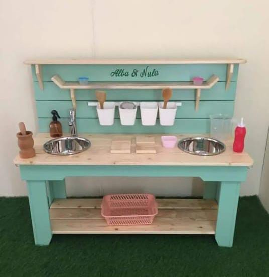 Hand built wooden kids mud kitchen