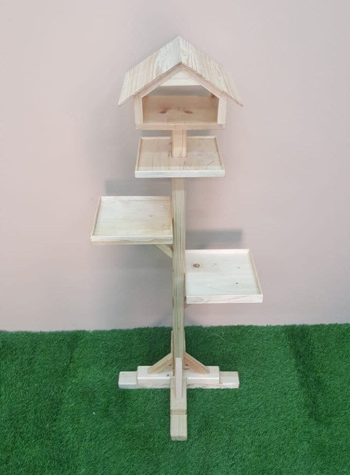 Beautiful wooden bird feeder with house