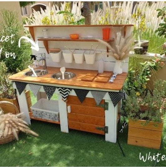 Hand built wooden mud kitchen